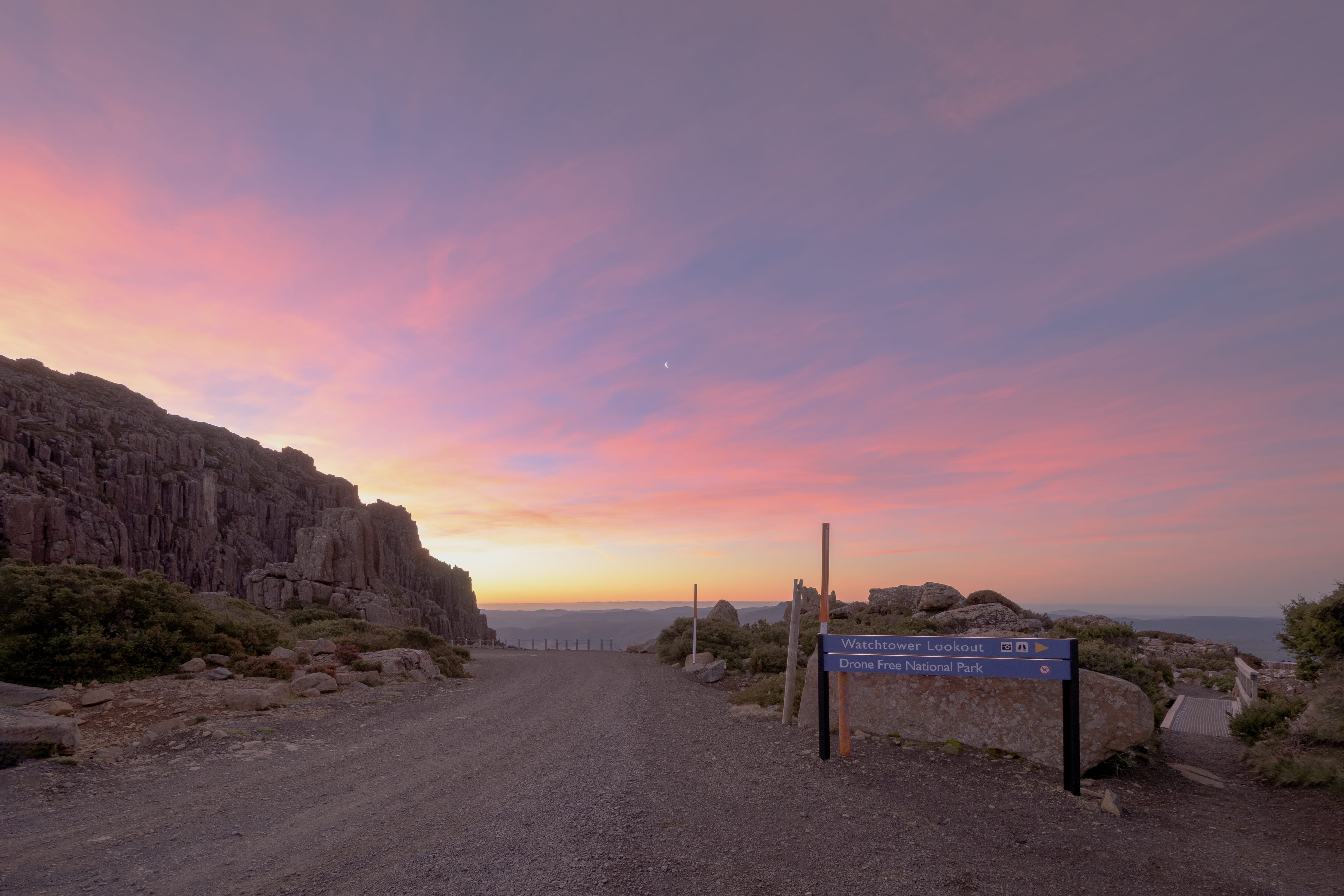 The road to Watchtower Lookout with rocky cliffs and pastel skies, Ben Lomond National Park, Tasmania