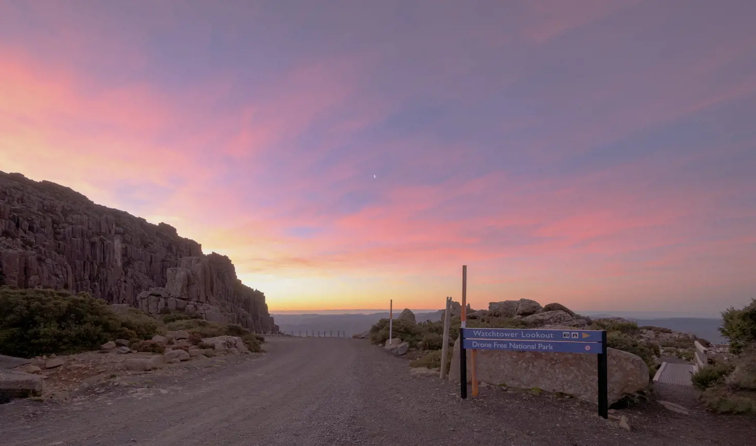 The road to Watchtower Lookout with rocky cliffs and pastel skies, Ben Lomond National Park, Tasmania